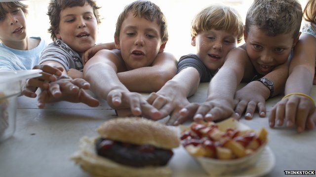 Picture of children reaching for food